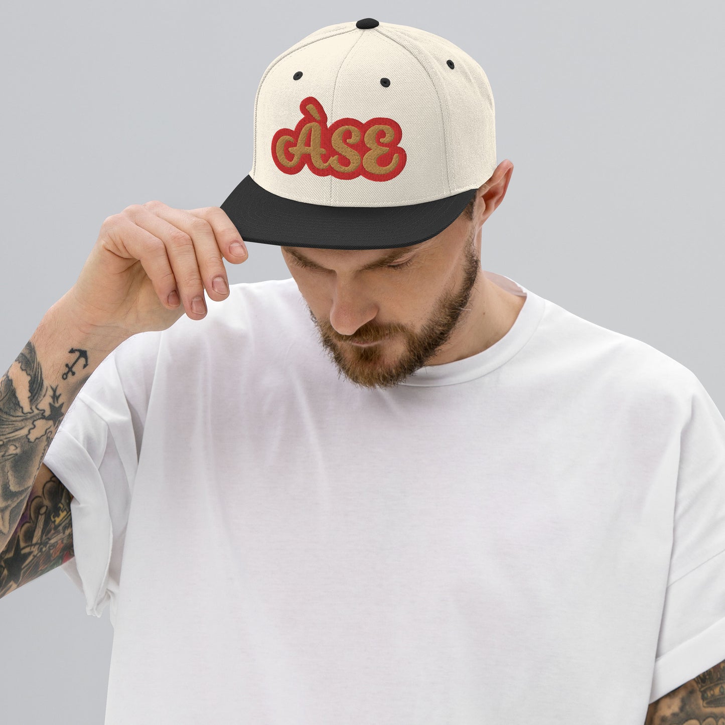 Àse Isese Red Reverse Script Snapback hat